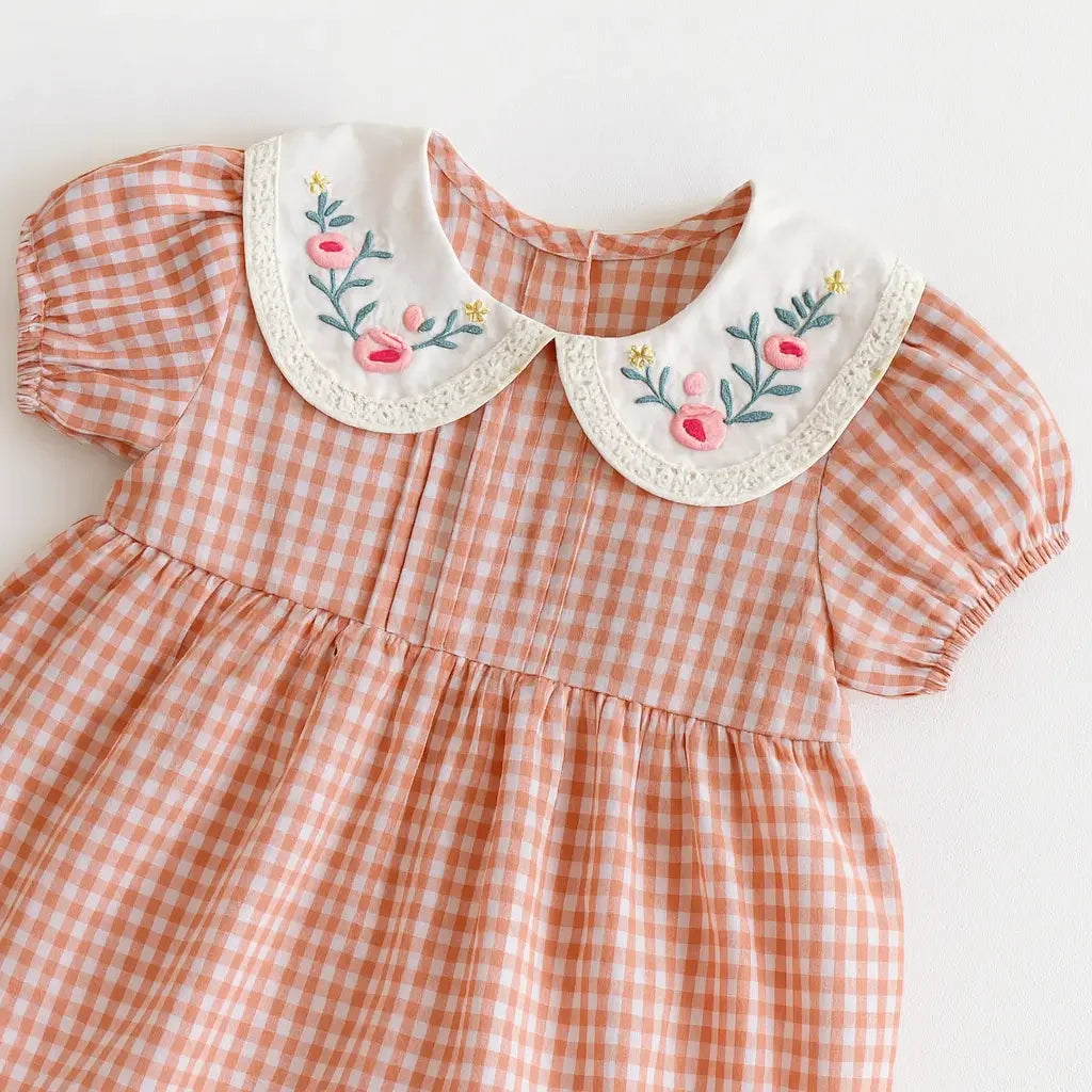 romper xadrez rosa com gola bordada