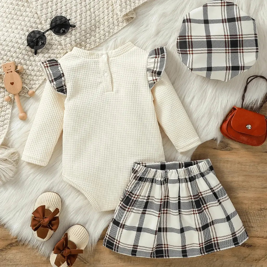 Conjunto bebê menina elegante com body creme manga longa e saia xadrez - vista de costas