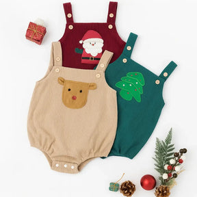 natalinos de bebê em veludo cotelê com alças – modelos com rena, Papai Noel e árvore de Natal, dispostos sobre fundo branco com decoração festiva